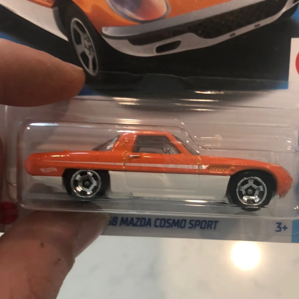 Orange and White 1968 Mazda Cosmo Sport
